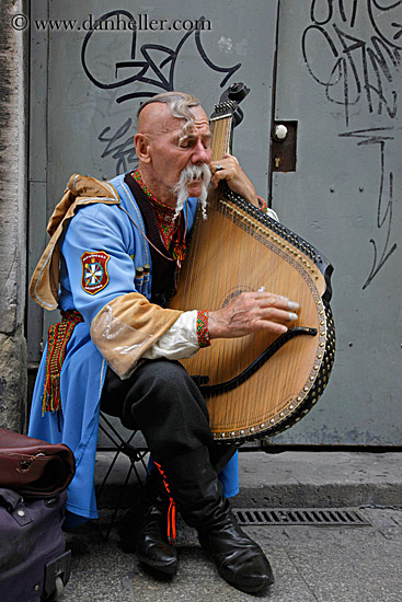 man-playing-odd-harp-4.jpg
