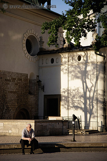 man-sitting-alone-in-shadows.jpg