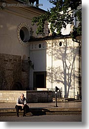 images/Europe/Poland/Krakow/People/Men/man-sitting-alone-in-shadows.jpg