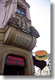 europe, facades, krakow, pizzeria, poland, signs, vertical, photograph