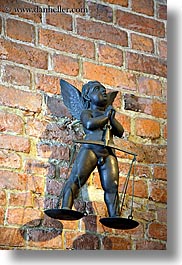 images/Europe/Poland/Krakow/WawelCastle/bronz-cherub-angel-scale-n-bricks.jpg