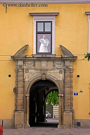 pope-waving-from-window-over-archway.jpg