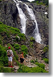 images/Europe/Poland/Waterfalls/women-looking-at-waterfall-2.jpg