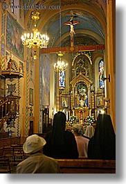images/Europe/Poland/Zakopane/Buildings/people-praying-in-church.jpg