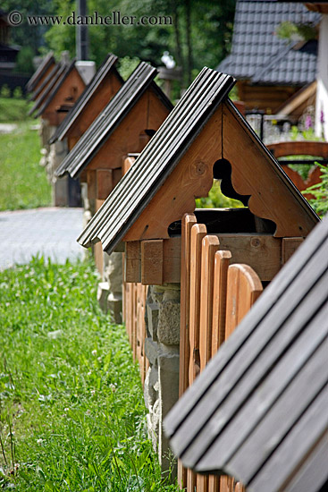 row-of-roofs-on-fence.jpg