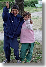 boys, childrens, emotions, europe, girls, gypsies, people, slovakia, smiles, vertical, photograph