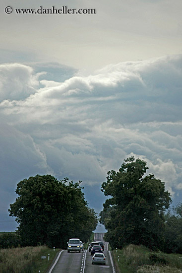 tree-lined-winding-road-n-clouds-1.jpg