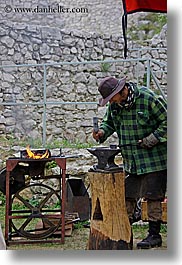 europe, irons, materials, men, people, slovakia, spis castle, stones, vertical, workers, photograph