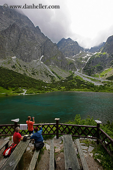 ppl-on-deck-overlooking-lake-n-mtns.jpg