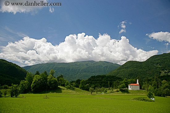 curch-n-clouds-over-mtns.jpg