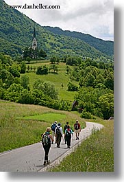 churches, dreznica, europe, hikers, hiking, paths, paved, people, slovenia, vertical, photograph