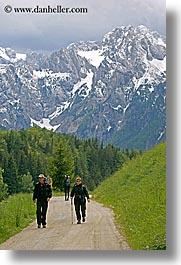 europe, hikers, hiking, logarska dolina, mountains, roads, slovenia, snowcaps, vertical, photograph