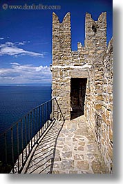 cities, clouds, europe, pirano, slovenia, tops, vertical, walls, water, photograph