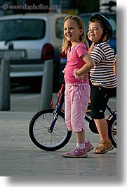 childrens, europe, girls, laughing, people, pirano, slovenia, vertical, photograph