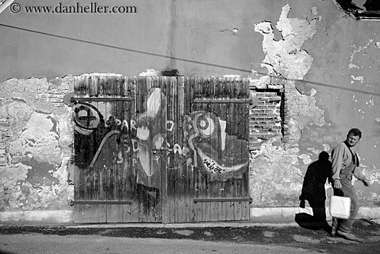 door-graffiti-n-man-walking-bw.jpg