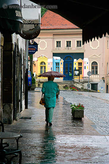 woman-walking-rain-umbrella-1.jpg