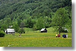 barn, europe, fields, hikers, hiking, horizontal, slovenia, triglavski narodni park, wildflowers, photograph