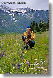 christie, europe, groups, men, mountains, photographers, scenics, slovenia, snowcaps, stuart, vertical, wildflowers, photograph