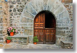 arches, doors, echo, europe, flowers, horizontal, spain, woods, photograph