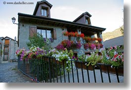 europe, flowers, horizontal, spain, torla, windows, photograph