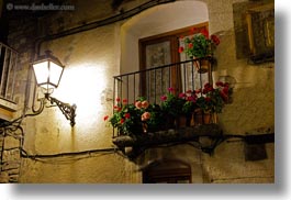 europe, flowers, glow, horizontal, lamp posts, lights, nite, slow exposure, spain, torla, windows, photograph