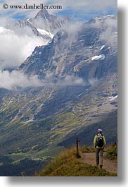 clouds, europe, grindelwald, hikers, mountains, nature, sky, snowcaps, switzerland, vertical, photograph