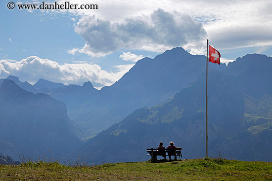 couple-on-bench-by-swiss-flag.jpg
