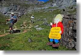 europe, hikers, hiking, horizontal, kandersteg, lake oeschinensee, men, people, signs, switzerland, photograph