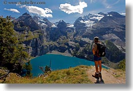 clouds, europe, hikers, horizontal, kandersteg, lake oeschinensee, lakes, mountains, nature, oeschinensee, people, sky, snowcaps, switzerland, photograph