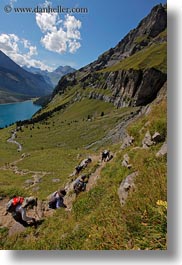 clouds, europe, hikers, kandersteg, lake oeschinensee, lakes, nature, oeschinensee, people, sky, switzerland, vertical, photograph