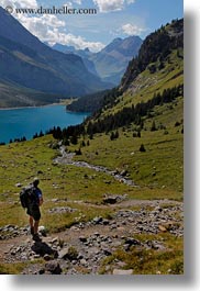 clouds, europe, hikers, kandersteg, lake oeschinensee, lakes, nature, oeschinensee, people, sky, switzerland, vertical, photograph