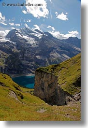 clouds, europe, grassy, kandersteg, lake oeschinensee, landscapes, mountains, nature, sky, snowcaps, switzerland, vertical, photograph