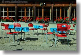 blues, chairs, europe, flowers, geraniums, horizontal, kandersteg, lake oeschinensee, nature, red, switzerland, tables, windows, photograph