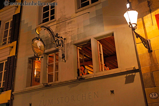 woman-in-window-at-night.jpg