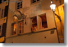 images/Europe/Switzerland/Lucerne/People/woman-in-window-at-night.jpg