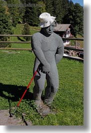 europe, hats, lucerne, statues, switzerland, vertical, weggis, photograph