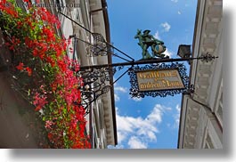 clouds, europe, horizontal, hotels, lucerne, mann, nature, signs, sky, switzerland, wilden, wilden mann hotel, photograph