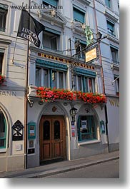 europe, hotels, lucerne, mann, signs, switzerland, vertical, wilden, wilden mann hotel, photograph