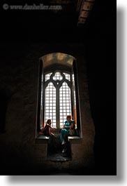 chateau de chillon, europe, montreaux, people, silhouettes, switzerland, vertical, windows, photograph