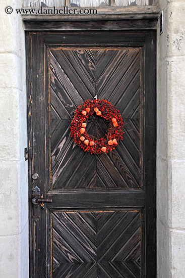 flower-wreath-on-wood-door.jpg