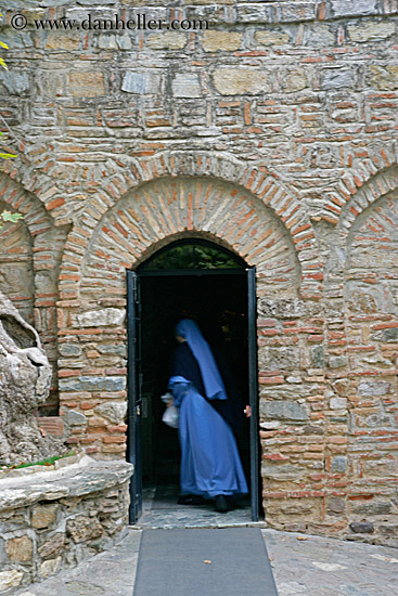 nun-entering-house.jpg