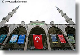 blue mosque, europe, flags, horizontal, istanbul, minaret, mosques, religious, turkeys, turkish, photograph