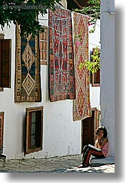 images/Europe/Turkey/Kas/girl-by-turkish-rugs-1.jpg