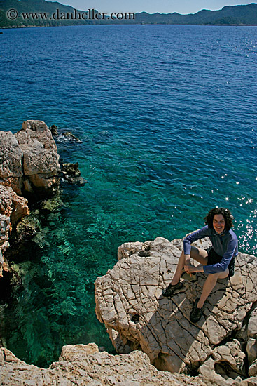 lori-on-rocks-overlooking-blue-ocean-1.jpg