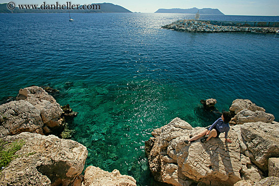 lori-on-rocks-overlooking-blue-ocean-3.jpg