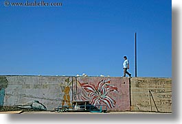 images/Europe/Turkey/Kas/man-walking-atop-mural.jpg