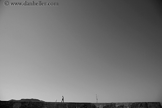 man-walking-on-wall-bw.jpg