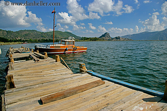 old-broken-wood-pier-n-boat.jpg