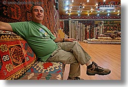 europe, horizontal, mahmut, men, relaxing, rugs, turkeys, turkmen rugs, photograph