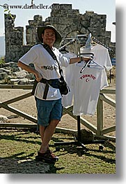 dans, europe, groups, hats, men, people, shirts, tourists, turkeys, vertical, photograph